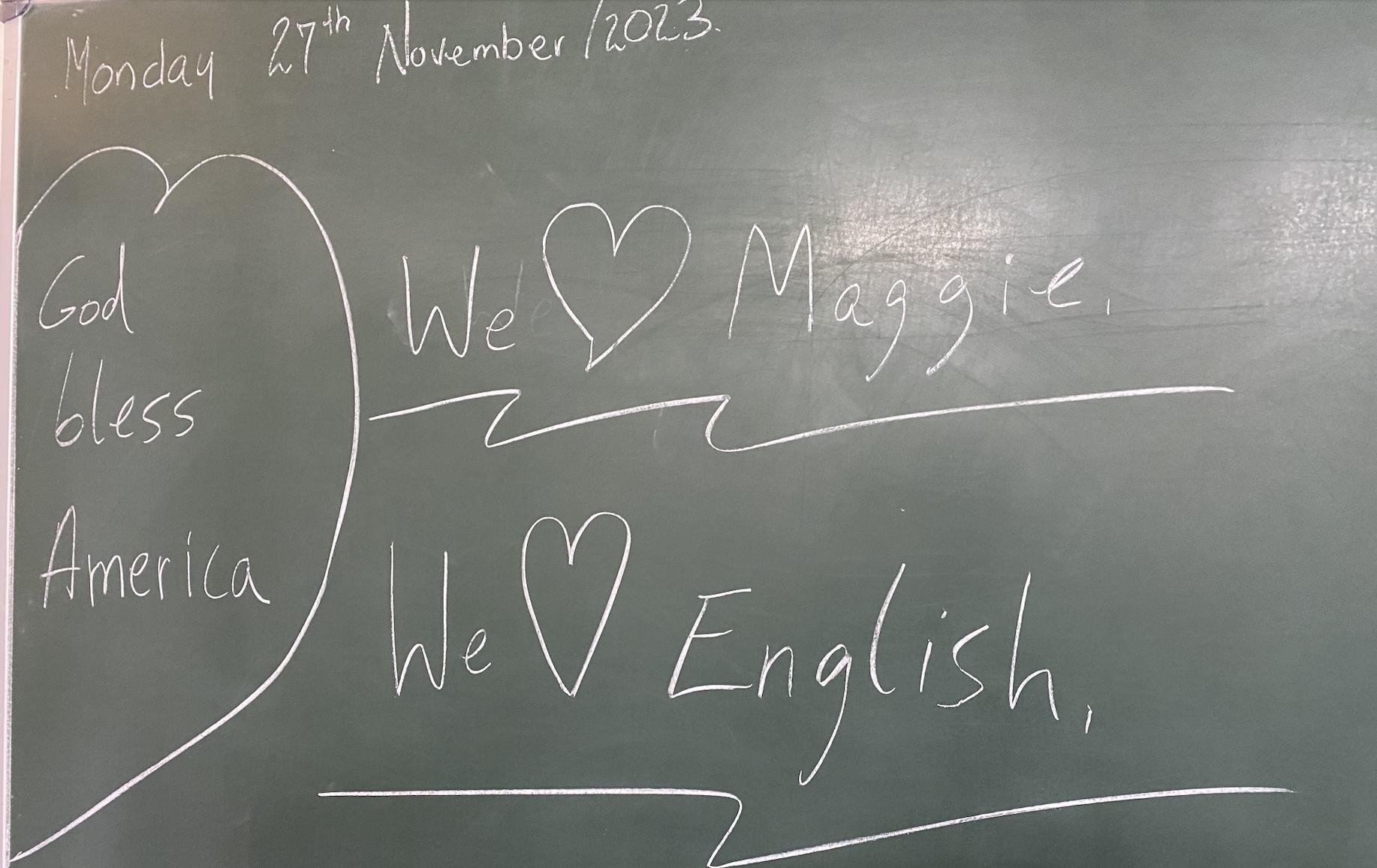 Maggie's name on a chalk board